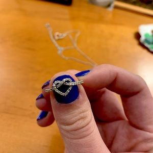 1/4 Carat diamond pretzel love knot heart ring in 10k white gold